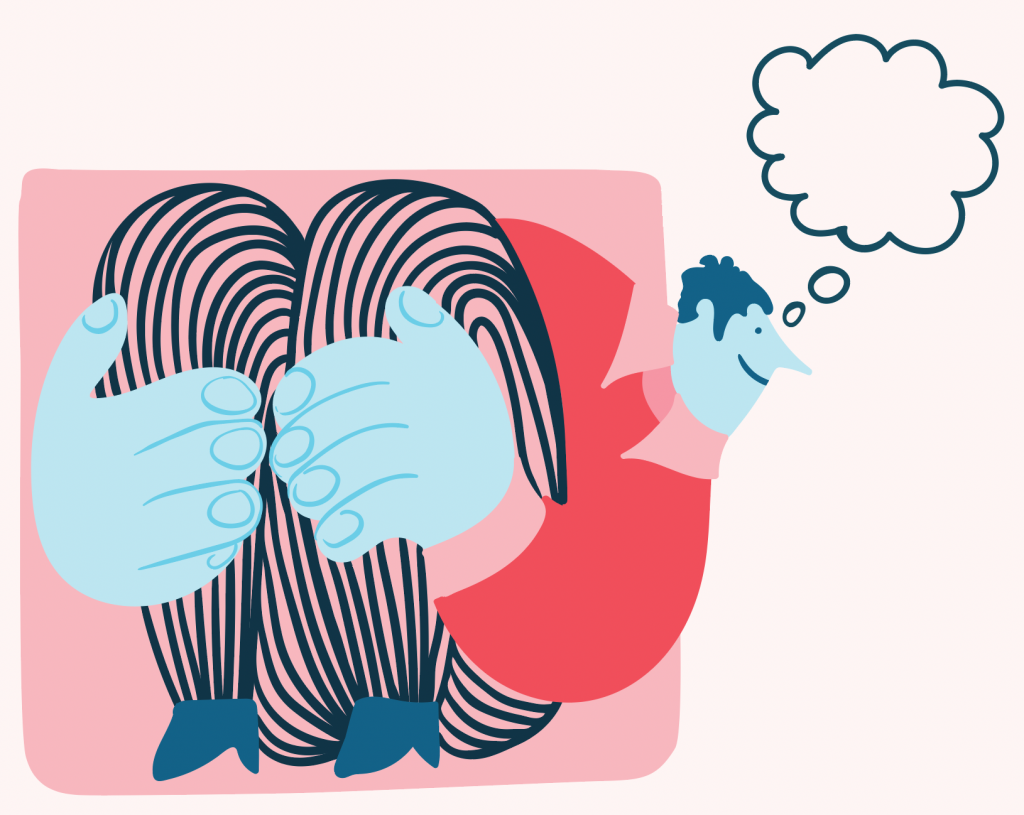 Mann som sitter og stikker hodet ut av en boks 